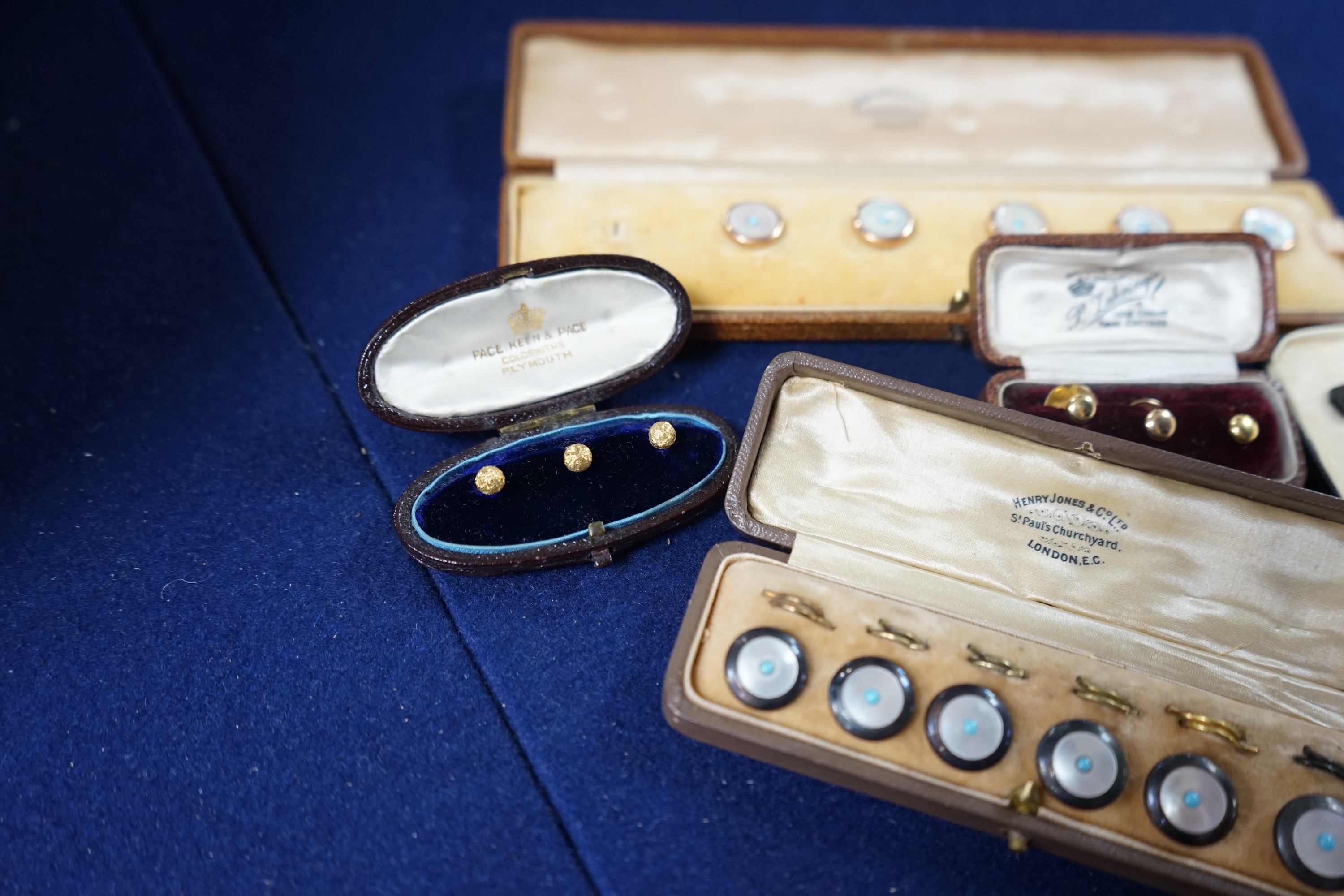 Two cased sets of three 18ct dress studs, 5.9 grams and three other cased sets of studs, one incomplete. Condition - fair to good